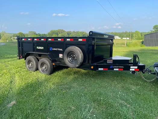 14-foot Load Trail hydraulic dump trailer for rent in Hopkins County, Kentucky - ideal for landscaping, construction debris, and heavy-duty hauling